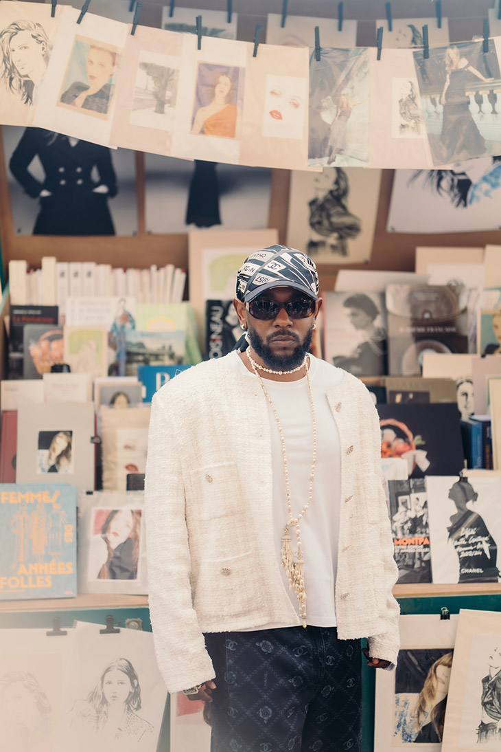 Kendrick Lamar with actress Lupita Nyong'o at Paris Fashion Week.